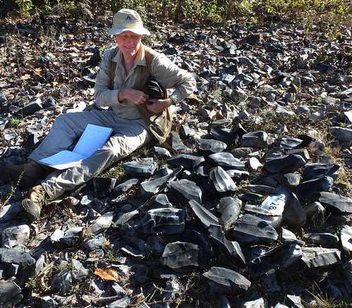 Chris Lloyd with obsidian cores in one of 300 obsidian mines