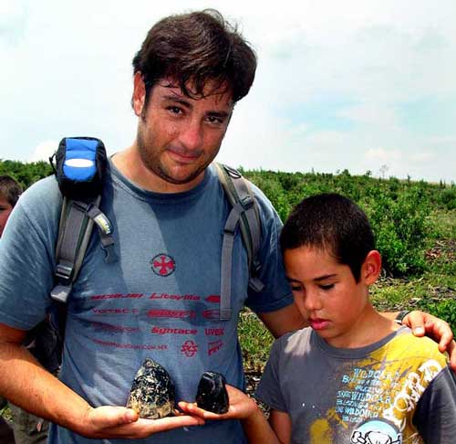 Rodrigo Maisterra and his son Mikel with obsidian cores